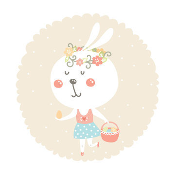 Vector easter bunny with egg and basket © tatiletters