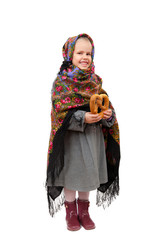 A little girl in traditional Russian kerchief with a pretzel in hand, isolated on white background