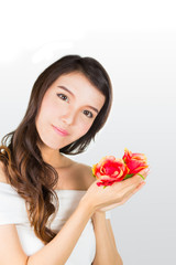 Beautiful young woman with flowers