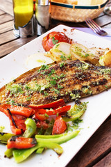Dorado fish fillet with vegetables