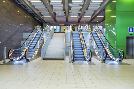 Top view of escalators, green color combination. panoramic angle of escalator