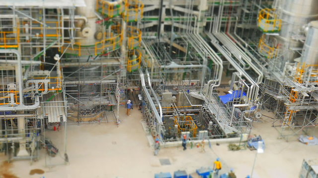 Industrial petroleum and refinery plant in construction phase ,Time lapse and tilt shift style 