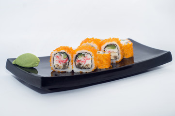 sushi rolls with wasabi and ginger cheese with orange caviar