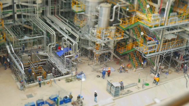 Industrial petroleum and refinery plant in construction phase ,Time lapse and tilt shift style 