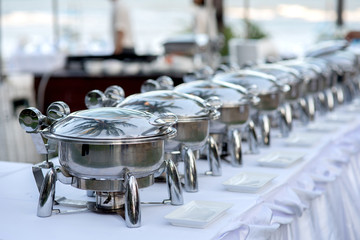 Buffet Table with Row of Food Service Steam Pans