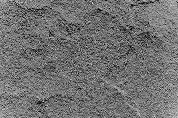 Wall fragment with attritions and cracks