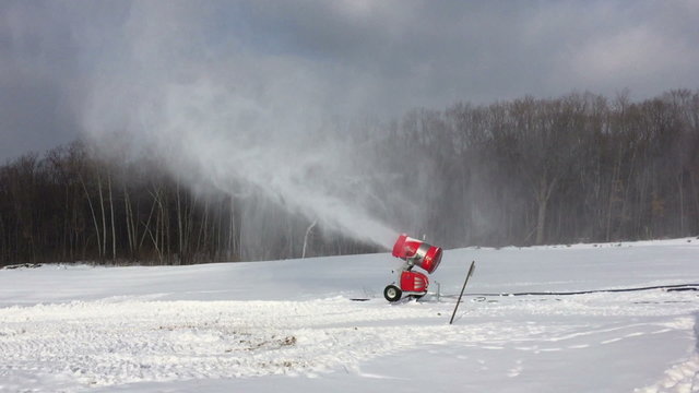 Snowmaking is the production of snow  on ski slopes.