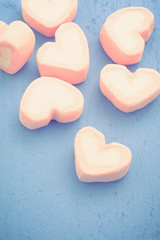 Fototapeta na wymiar Pink heart shape of marshmallow with filter effect retro vintage