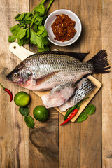 Fresh raw fish on the wood