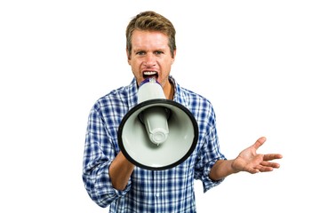 Portrait of man shouting through megaphone 