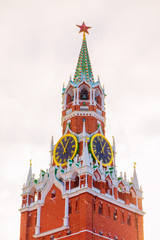 Kremlin's Spassky Tower winter snowfall sky clouds