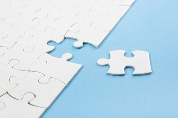 Missing jigsaw puzzle pieces. Business concept. Compliting final task