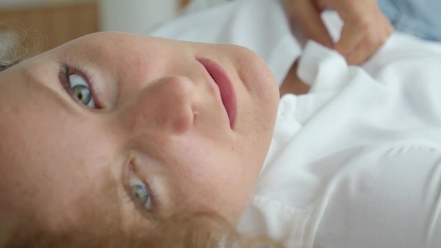 Tempting Sensual Woman Lying on Bed and Seducing 