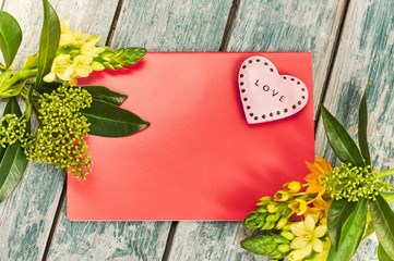Valentines Day with heart/Heart and flowers with place for text on red background