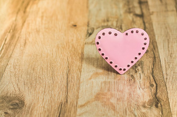 Valentines Day with pink heart/Heart with place for text on the wooden background