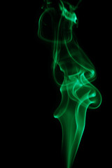 Obraz premium Abstract green smoke on black background