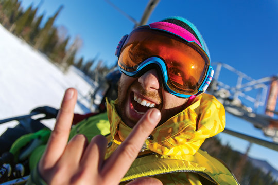  health lifestyle image of young snowboarder