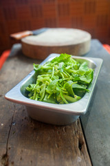 Chinese morning glory vegetable in the stainless cup ready for cooking