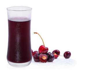 glass of cherry and juice cherries isolated on white background