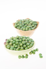 nuts or crispy coated green pea on the background.