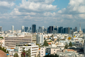 view of a modern city, city of Tel Aviv, in winter with clouds