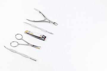 Tools of a manicure set on a white background.