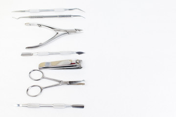 Tools of a manicure set on a white background.
