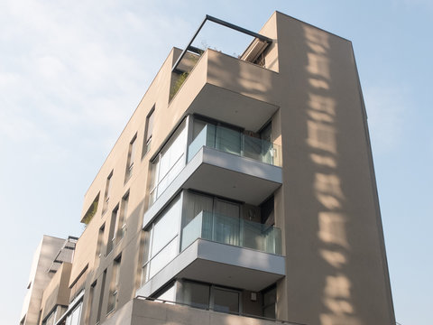 Sun Shining On Modern Low Rise Apartment Building