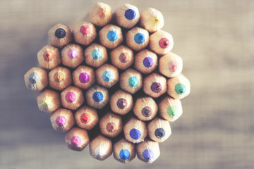 Color pencils on wooden desk