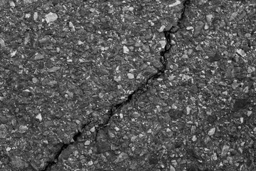 Road surface cracks or collapsed ea