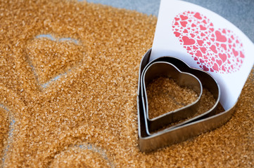 Hearts in brown sugar made with cookie cutter for Valentine's Day