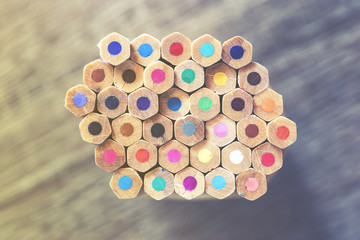 Color pencils on wooden desk