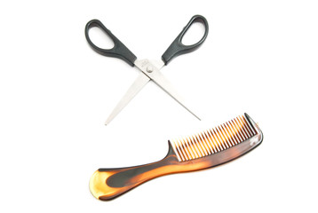 plastic comb and scissors