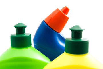three different bottles of detergent closeup