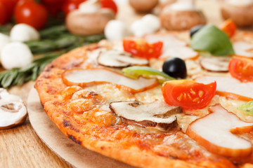 Pizza with mushrooms and vegetables