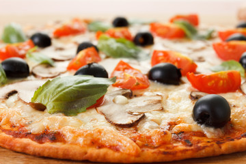 Pizza with mushrooms and vegetables