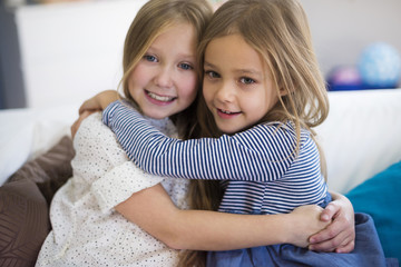 Close up of girls embracing each other