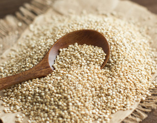 Pile of White Quinoa with a spoon