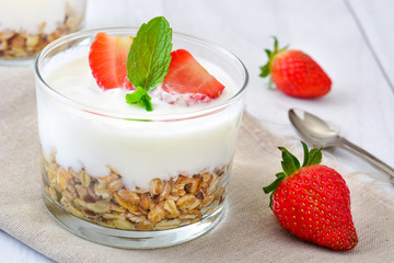 Yogurt with cereals and strawberries
