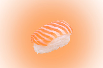 Salmon sushi in chopsticks on white background.