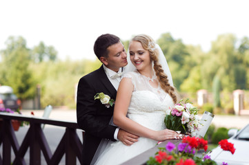 Shining with happiness. Shot of a young loving couple posing together on their wedding day soft focus