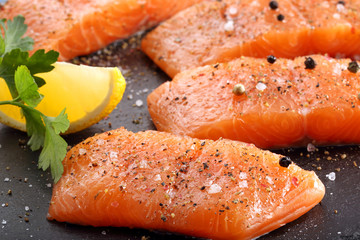Fresh salmon with herbs ready for baking