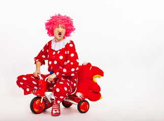 Funny clown in pink wig