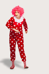 Funny clown in pink wig