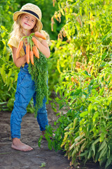The farmer kid with vegetables