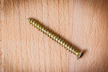 Goldish screw.