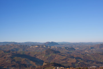 Panorama of the mountains, the countryside and sky.