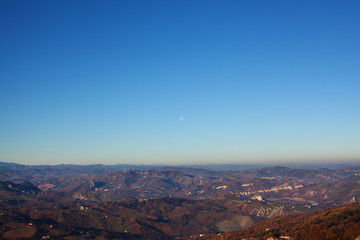 Panorama of the mountains, the countryside and sky.