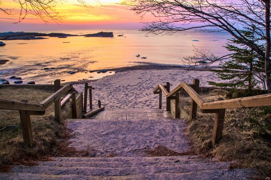 Lake Superior Sunset. Stairs leading to a beautiful Lake Superior sunset beach at the Hurricane River Campground in Pictured Rocks National Lakeshore.