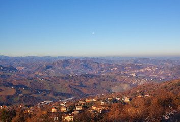 Panorama of the mountains, the countryside and sky.